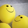 yellow smiley emoji on gray textile